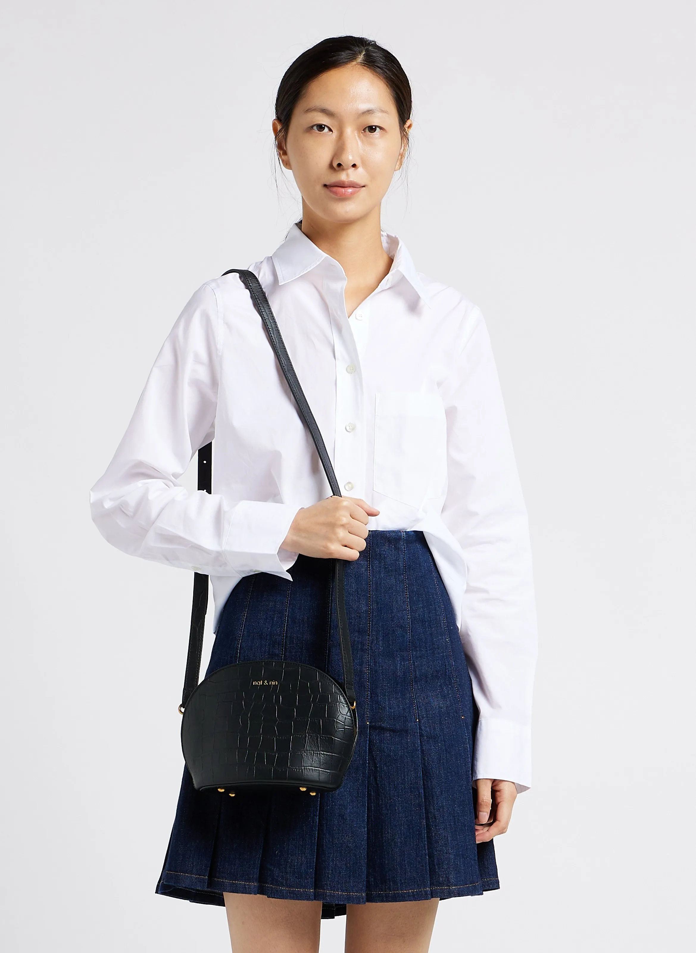  NAT & NIN   POPPY - Borsa a tracolla in pelle a mezzaluna | Nero