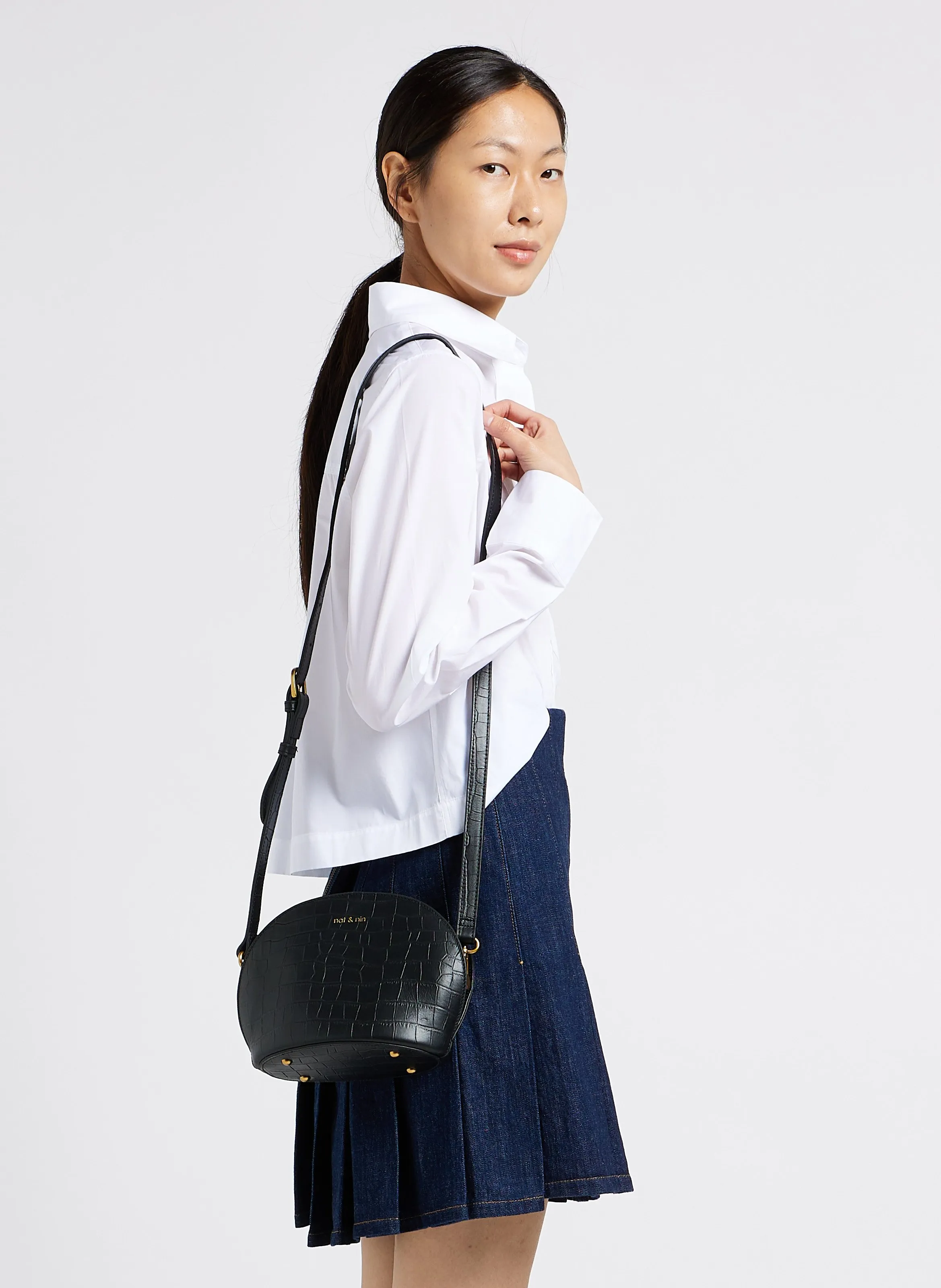  NAT & NIN   POPPY - Borsa a tracolla in pelle a mezzaluna | Nero